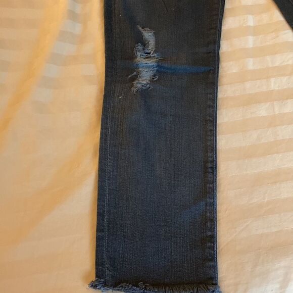 AG Denim The Stilt Crop Cigarette Crop in Black with Shredded Front Legs. - Picture 3 of 12